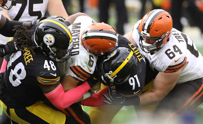 Steelers outside linebacker Bud Dupree (48) and defensive end Stephon Tuitt (91) combine to sack Browns quarterback Baker Mayfield (6) during the first quarter at Heinz Field in Pittsburgh, Oct. 18, 2020.